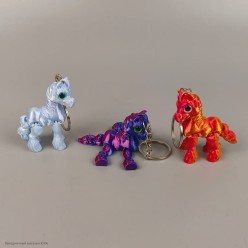 Брелок СГ Лошадка перламутровая (пластик) 6*4 см